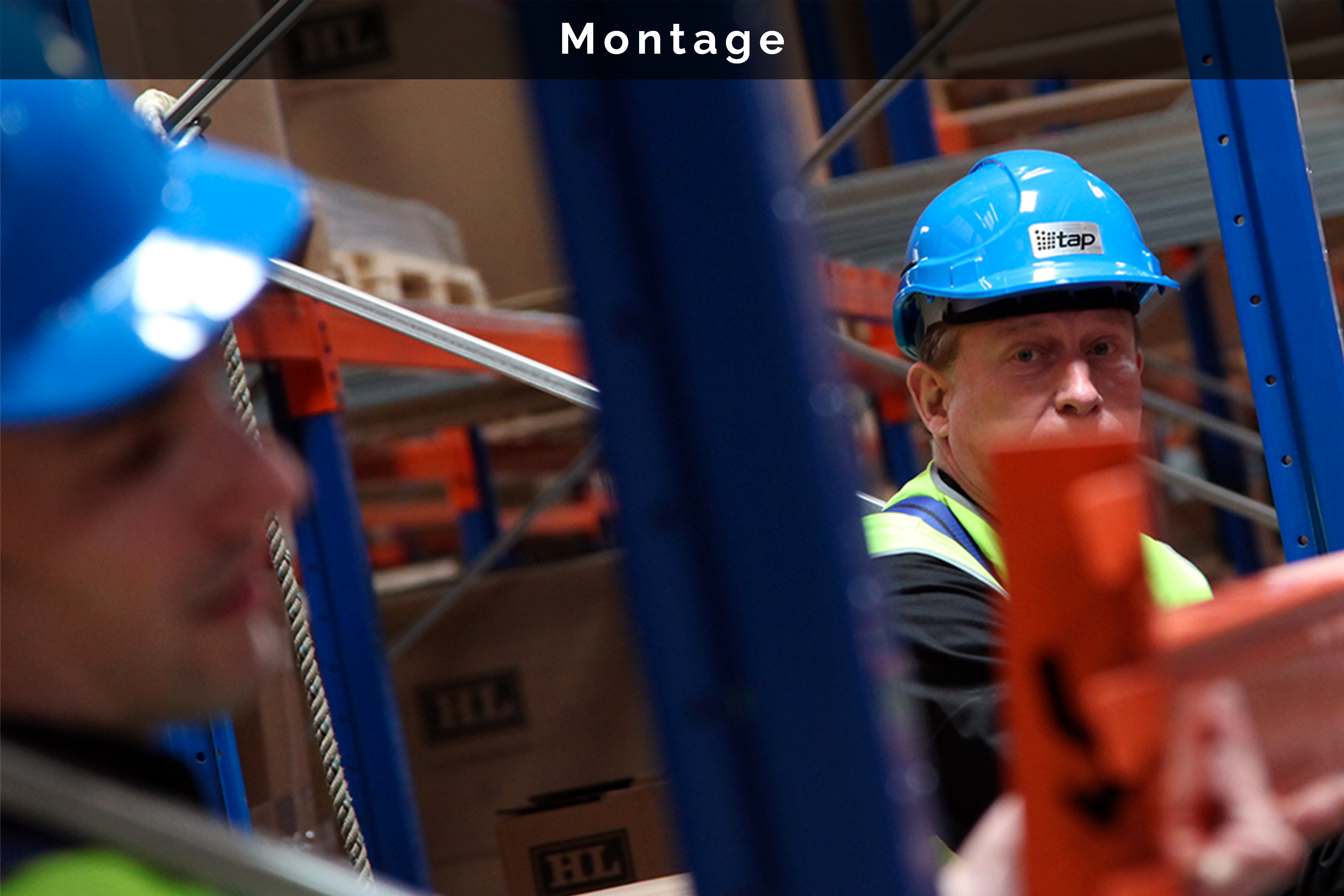 2 people facing each other in a warehouse